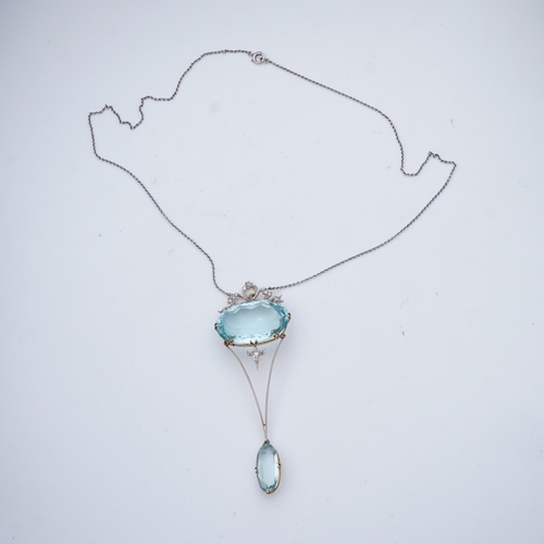 434 - An Edwardian aquamarine and diamond pendant necklace, early 20th century, composed of an oval aquama... 