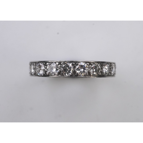 438 - A diamond eternity ring, set with a continuous line of brilliant-cut diamonds totalling approximatel... 