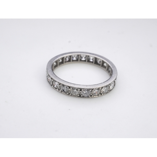 438 - A diamond eternity ring, set with a continuous line of brilliant-cut diamonds totalling approximatel... 