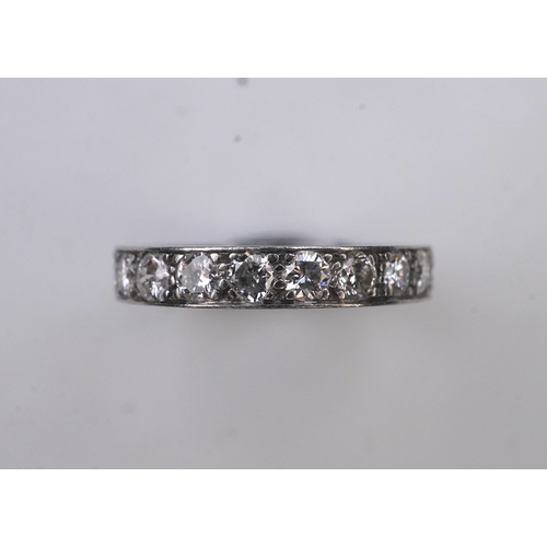 438 - A diamond eternity ring, set with a continuous line of brilliant-cut diamonds totalling approximatel... 