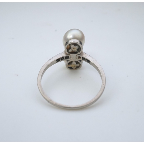 444 - A pearl and diamond toi-et-moi ring, circa 1920 set with a pair of pearls, each measuring approximat... 