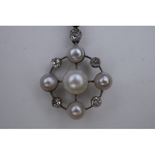 445 - A pearl and diamond pendant, early 20th century, the knife wire frame pendant of circular outline se... 