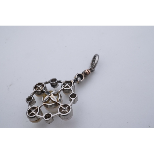 445 - A pearl and diamond pendant, early 20th century, the knife wire frame pendant of circular outline se... 