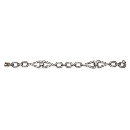 450 - An Art Deco diamond bracelet, France, circa 1930, composed of geometric linking, set with circular-c... 