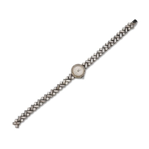 451 - Aster, a stylish lady's diamond cocktail watch, 1960s, the circular silvered dial within a bezel set... 