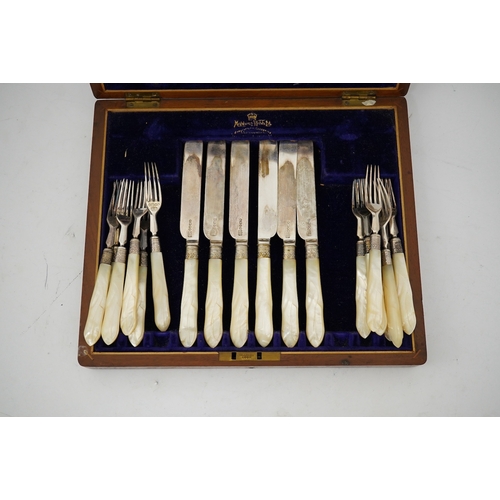 46 - Twelve pairs of Victorian mother of pearl handled silver dessert eaters, by Mappin & Webb, Sheffield... 