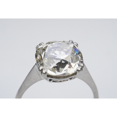 464 - A solitaire diamond ring, early 20th century, claw-set with an antique cushion-shaped diamond stated... 