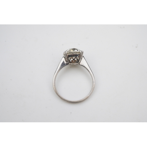 464 - A solitaire diamond ring, early 20th century, claw-set with an antique cushion-shaped diamond stated... 