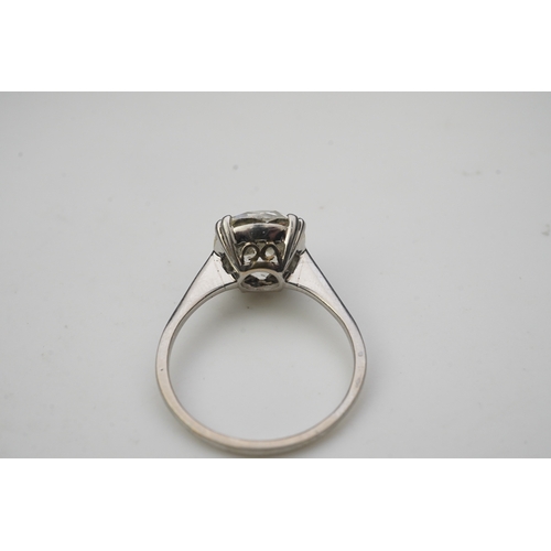 464 - A solitaire diamond ring, early 20th century, claw-set with an antique cushion-shaped diamond stated... 