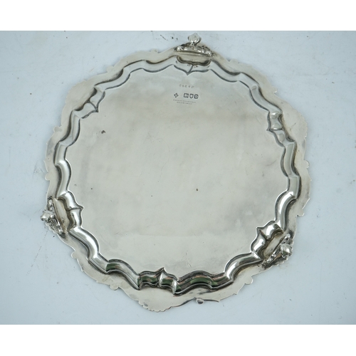 48 - A late Victorian silver salver, by Martin, Hall & Co, with shell and scroll border and later engrave... 