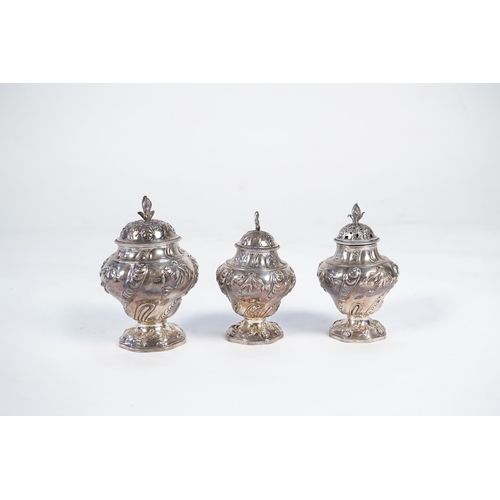 5 - A George II mahogany cased set of two early George III silver tea caddies and covers and a sugar vas... 