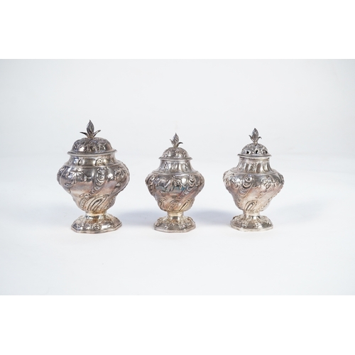 5 - A George II mahogany cased set of two early George III silver tea caddies and covers and a sugar vas... 