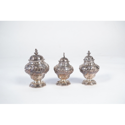 5 - A George II mahogany cased set of two early George III silver tea caddies and covers and a sugar vas... 