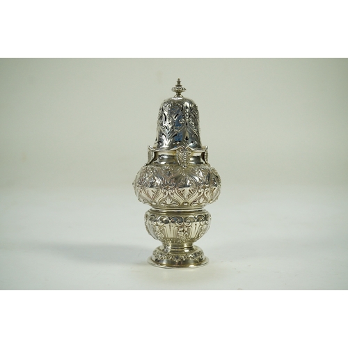 64 - An ornate Edwardian silver sugar castor by Holland, Aldwinckle & Slater, of inverted double gourd fo... 