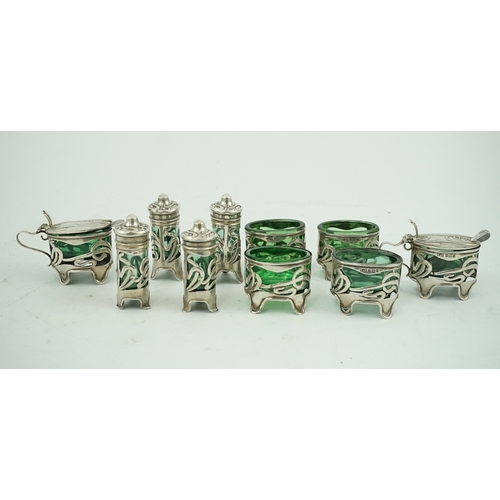 68 - An early 20th century Art Nouveau pierced silver ten piece condiment set by Levy & Salaman, comprisi... 