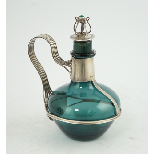 71 - A Guild of Handicraft Ltd silver mounted decanter designed by Charles Robert Ashbee, the Whitefriars... 