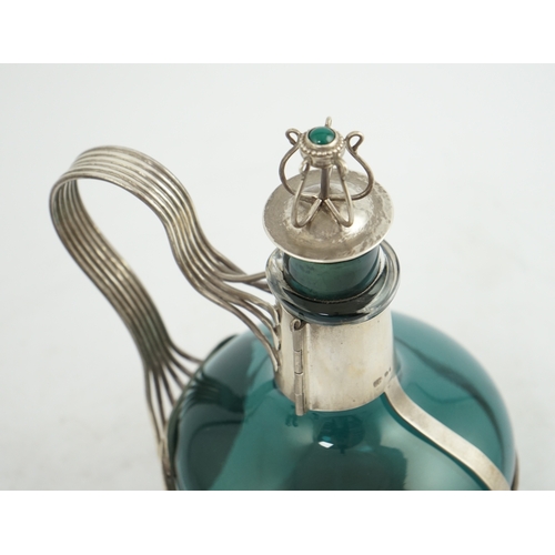 71 - A Guild of Handicraft Ltd silver mounted decanter designed by Charles Robert Ashbee, the Whitefriars... 