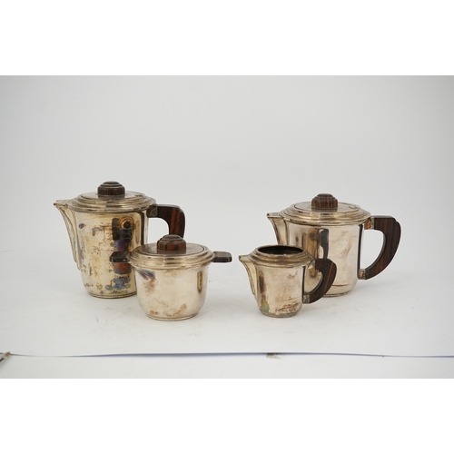 75 - A stylish French Art Deco 950 standard silver and rosewood mounted four piece tea set, comprising a ... 