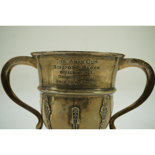 82 - A George V silver two handled presentation trophy cup by The Goldsmiths & Silversmiths Co Ltd, with ... 