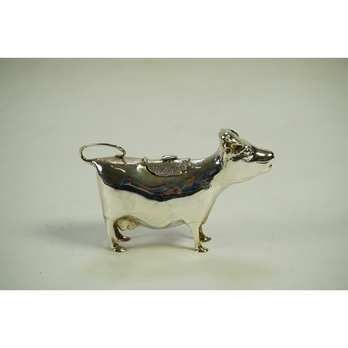 84 - An Elizabeth II silver cow creamer by William Comyns & Sons Ltd, London, 1966, length 15cm, 5.3oz.... 