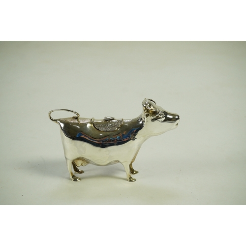 84 - An Elizabeth II silver cow creamer by William Comyns & Sons Ltd, London, 1966, length 15cm, 5.3oz.... 