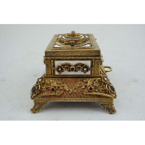 91 - A late Karl Griesbaum Model 17 silver gilt, white enamel, garnet and cultured pearl set automaton si... 