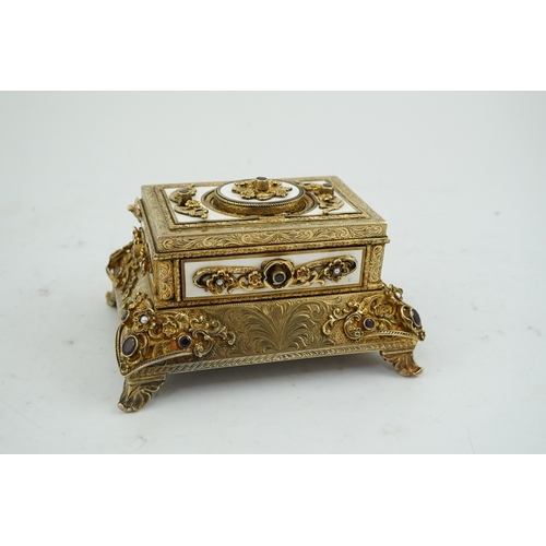 91 - A late Karl Griesbaum Model 17 silver gilt, white enamel, garnet and cultured pearl set automaton si... 