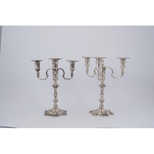 96 - A pair of Elizabeth II cast silver three branch, three light candelabra, by J.B. Chatterley & Sons L... 