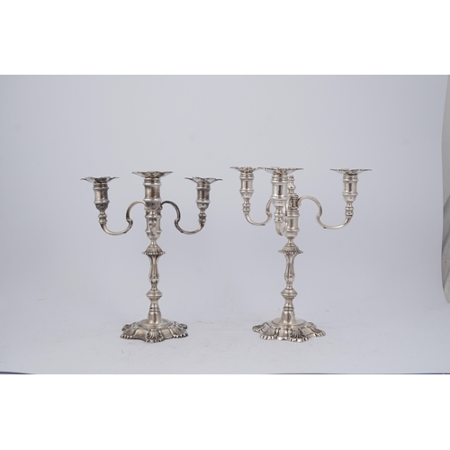 96 - A pair of Elizabeth II cast silver three branch, three light candelabra, by J.B. Chatterley & Sons L... 