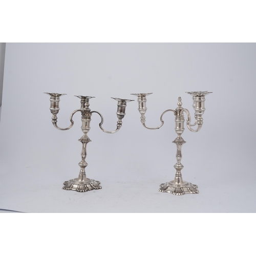 96 - A pair of Elizabeth II cast silver three branch, three light candelabra, by J.B. Chatterley & Sons L... 