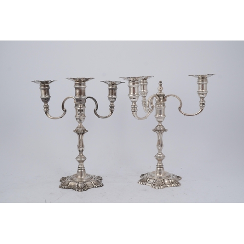 96 - A pair of Elizabeth II cast silver three branch, three light candelabra, by J.B. Chatterley & Sons L... 