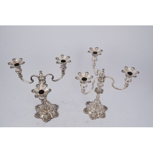 96 - A pair of Elizabeth II cast silver three branch, three light candelabra, by J.B. Chatterley & Sons L... 