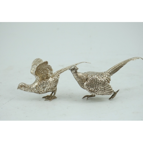 99 - A pair of Elizabeth II silver free-standing model pheasants, by Edward Barnard & Sons Ltd, London, 1... 