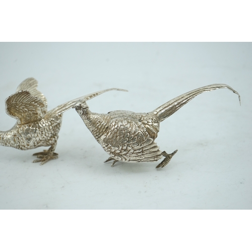 99 - A pair of Elizabeth II silver free-standing model pheasants, by Edward Barnard & Sons Ltd, London, 1... 