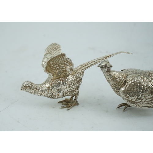 99 - A pair of Elizabeth II silver free-standing model pheasants, by Edward Barnard & Sons Ltd, London, 1... 