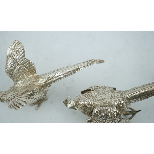 99 - A pair of Elizabeth II silver free-standing model pheasants, by Edward Barnard & Sons Ltd, London, 1... 