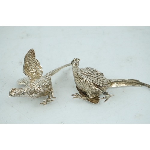 99 - A pair of Elizabeth II silver free-standing model pheasants, by Edward Barnard & Sons Ltd, London, 1... 