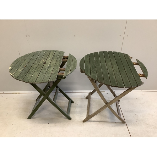 1048 - Two slatted wood folding garden tables and four chairs. Condition - very poor