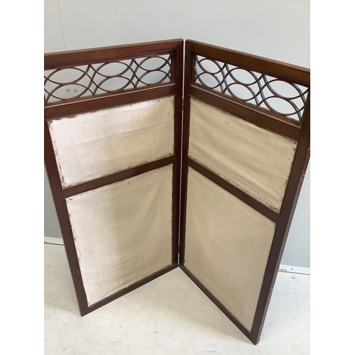 1062 - An Edwardian mahogany two fold screen, each panel width 53cm, height 113cm. Condition - fair