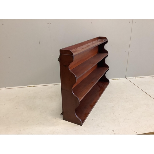 1064 - A Victorian mahogany four tier wall bracket, width 108cm, height 71cm. Condition - good