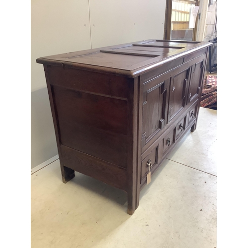 1066 - An 18th century panelled oak mule chest, width 126cm, depth 54cm, height 76cm. Condition - fair... 