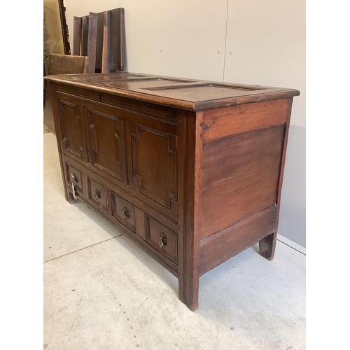 1066 - An 18th century panelled oak mule chest, width 126cm, depth 54cm, height 76cm. Condition - fair... 