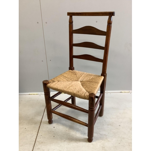 1094 - A set of four 19th century ash ladderback rush seat dining chairs. Condition - fair