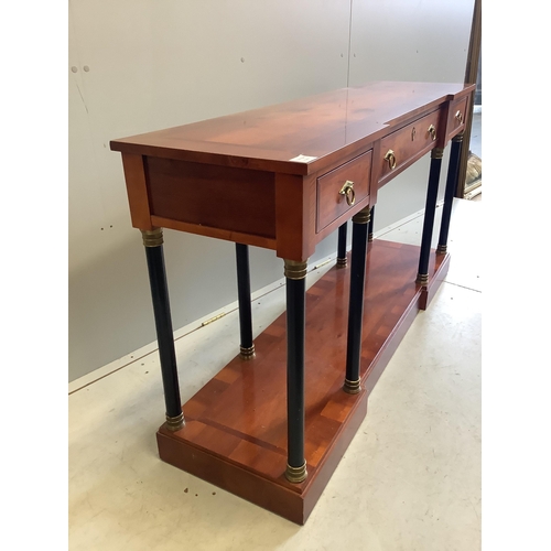 1104 - A French Empire style mahogany and ebonised three drawer console table, width 147cm, depth 41cm, hei... 