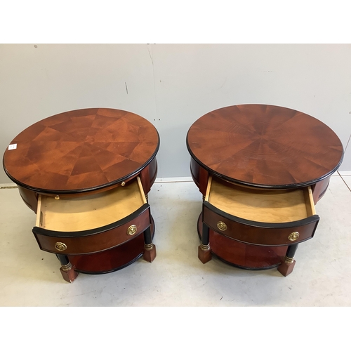 1107 - A pair of French Empire style mahogany and ebonised two tier circular tables, diameter 65cm, height ... 