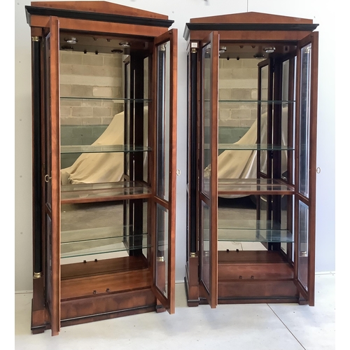 1120 - A pair of French Empire style mahogany and ebonised two door display cabinets, width 92cm, depth 42c... 