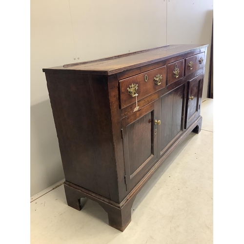 1134 - An 18th century oak low dresser, width 154cm, depth 42cm, height 90cm. Condition - fair