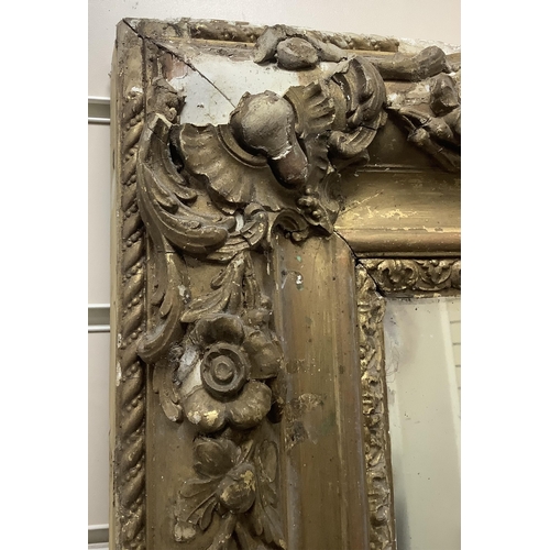 1135 - A large Victorian rectangular giltwood and composition overmantel mirror, width 137cm, height 178cm.... 