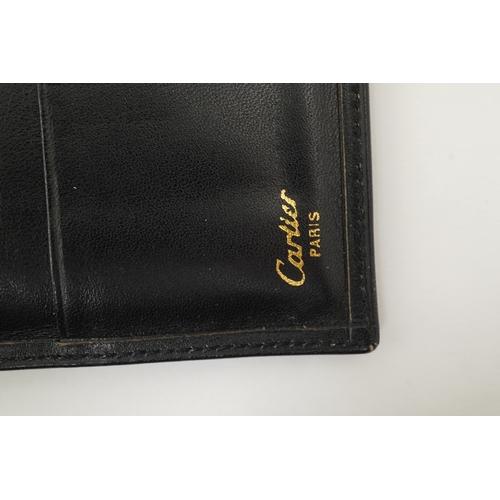 1254 - A gentleman's black Cartier wallet