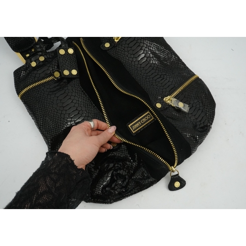 1256 - A vintage Jimmy Choo black snakeskin and elasticated material handbag with zip detail.